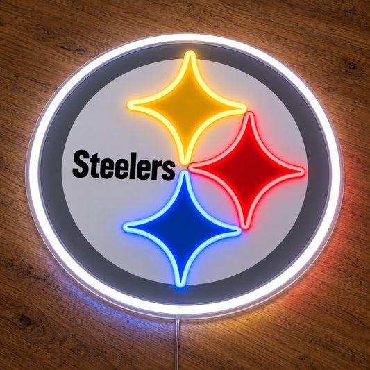 Pittsburgh Steelers LED Neon Sign, featuring illuminated team logo on a wooden surface.