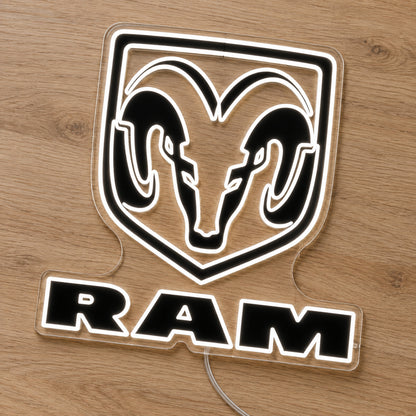Ram LED Neon Sign, featuring illuminated vehicle logo on a wooden surface.