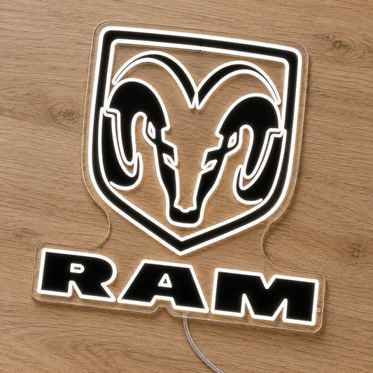 Ram LED Neon Sign, featuring illuminated vehicle logo on a wooden surface.