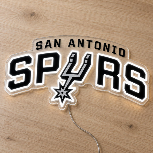 San Antonio Spurs LED Neon Sign, featuring illuminated team logo on a wooden surface.