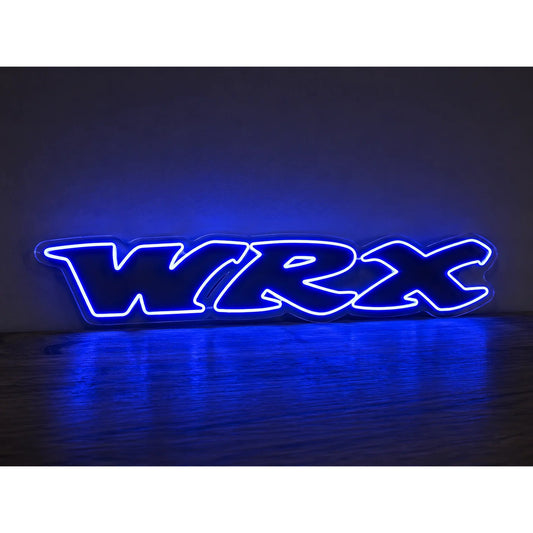 Subaru WRX Old Logo LED Neon Sign – Blue in blue, featuring WRX logo lettering on a dark reflective surface.