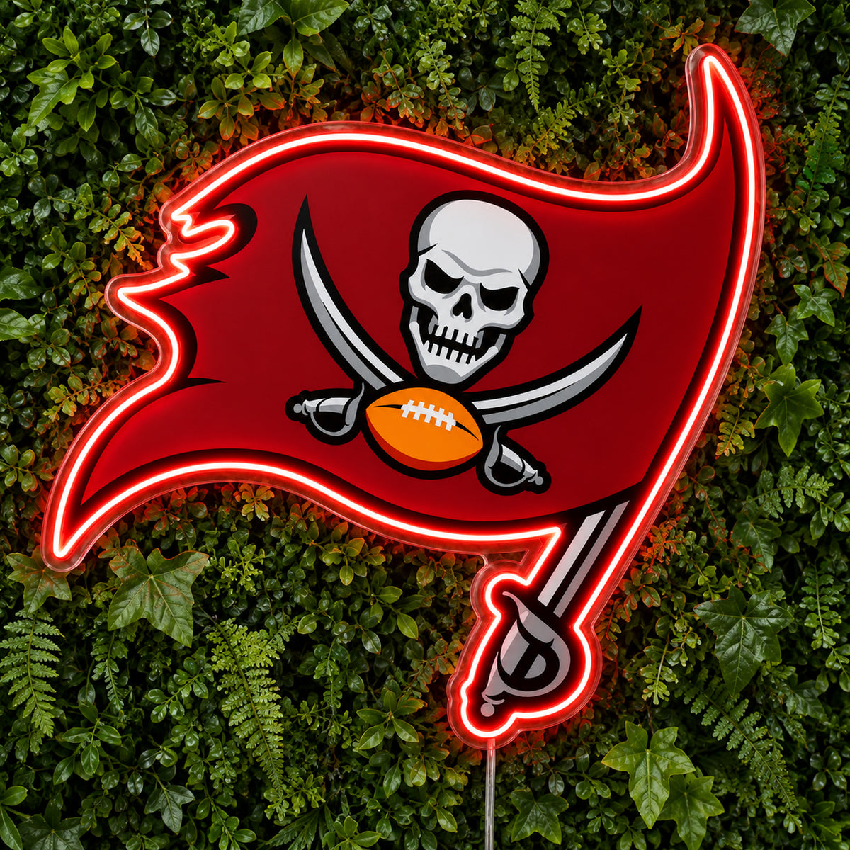 Tampa Bay Buccaneers LED Neon Sign, featuring illuminated team logo on a green foliage wall.