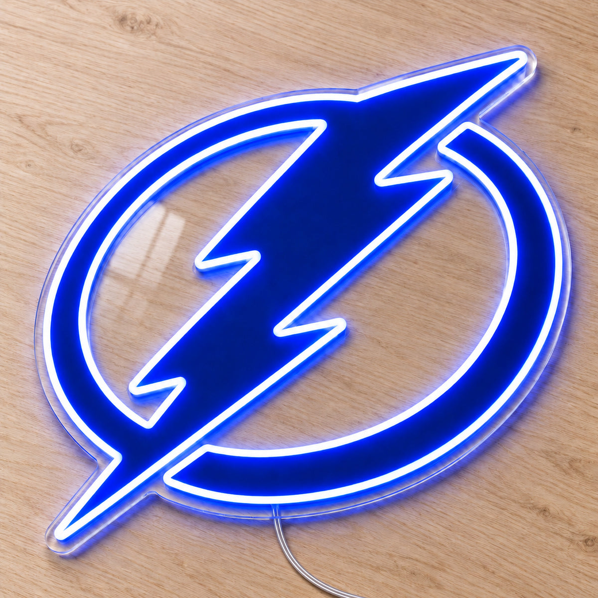 Tampa Bay Lightning LED Neon Sign, featuring team logo displayed on a wooden surface.