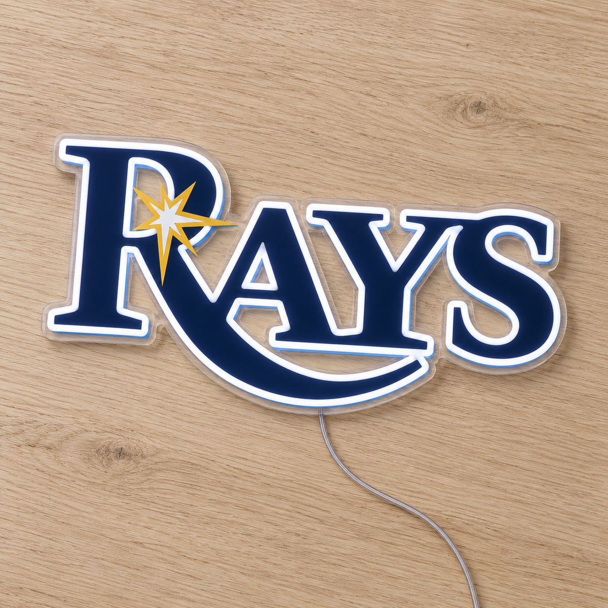 Tampa Bay Rays LED Neon Sign, featuring illuminated team logo on a wooden surface.