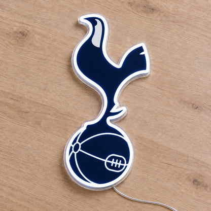 Tottenham LED Neon Sign, featuring team logo displayed on a wooden surface.