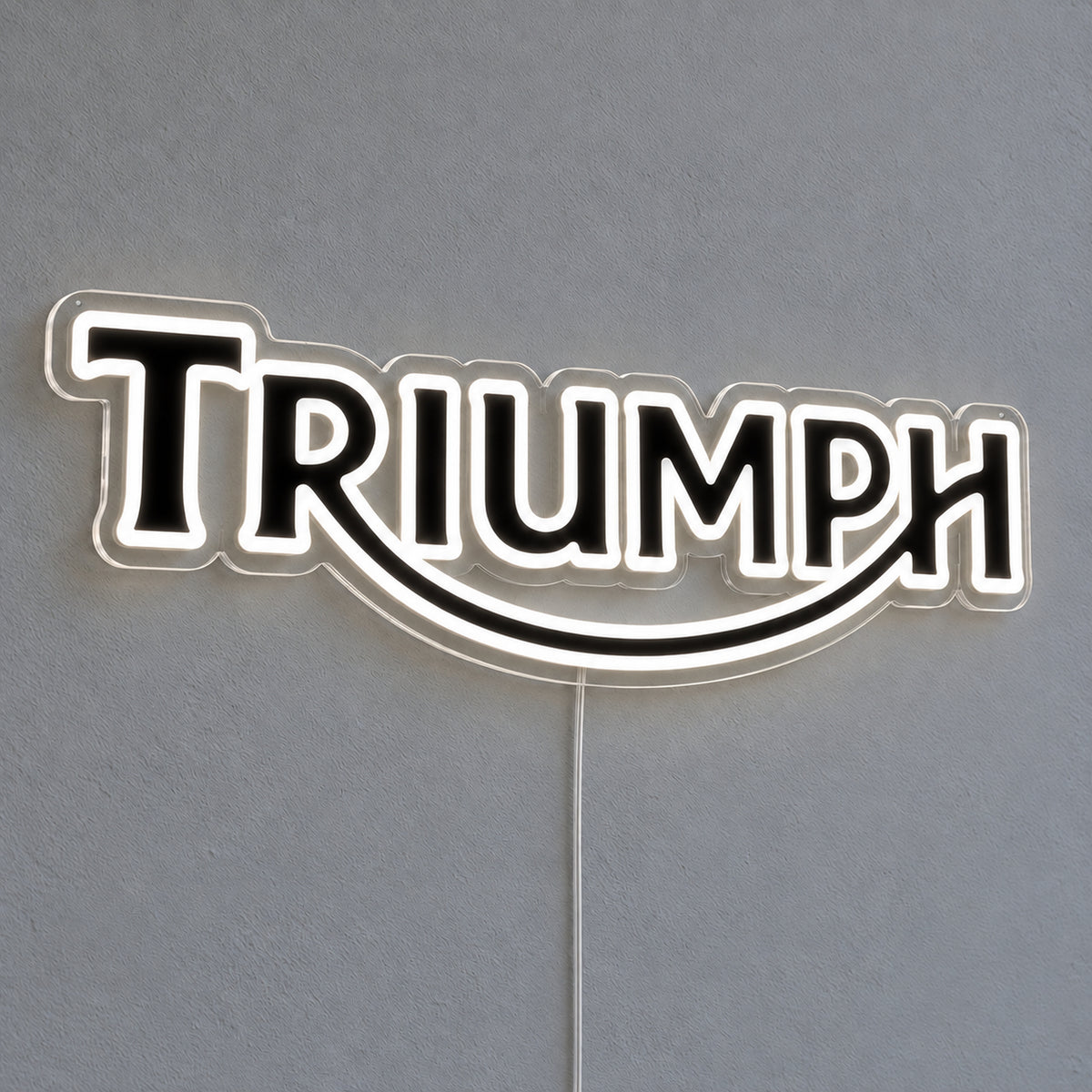 Triumph LED Neon Sign, featuring illuminated vehicle logo on a light background.