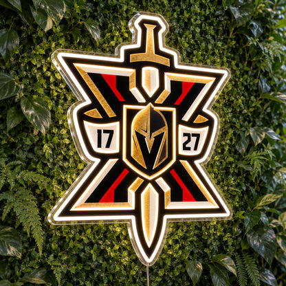 Vegas Golden Knights LED Neon Sign, featuring team logo displayed on a green foliage wall.