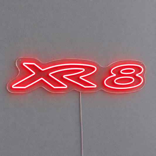 XR8 Ford Falcon LED Neon Sign in red, featuring XR8 lettering on a grey wall.