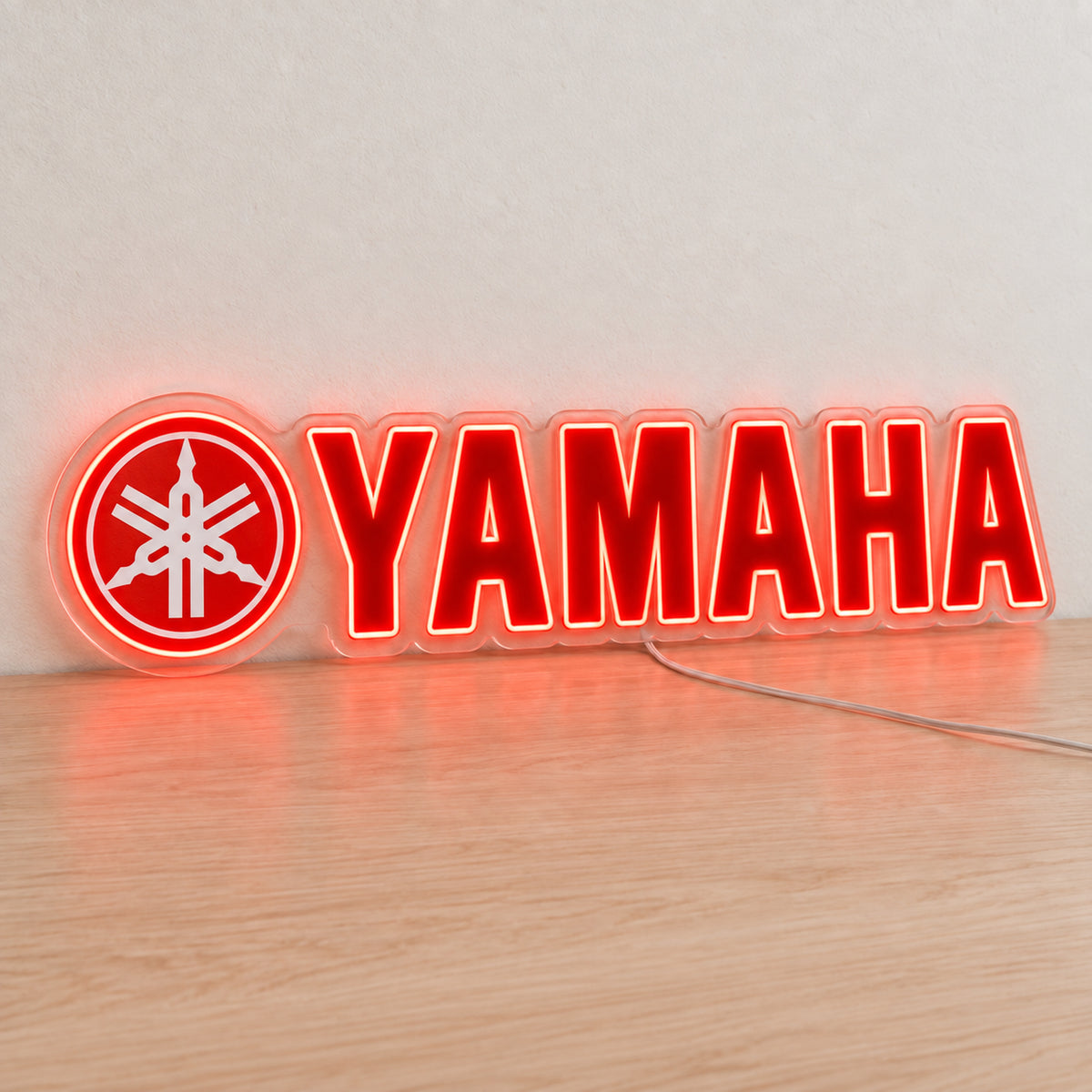 Yamaha (Red) 2 LED Neon Sign, featuring illuminated vehicle logo on a light background.