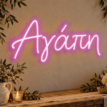Agapi Greek Love Neon Sign in pink LED neon on clear acrylic, angled view
