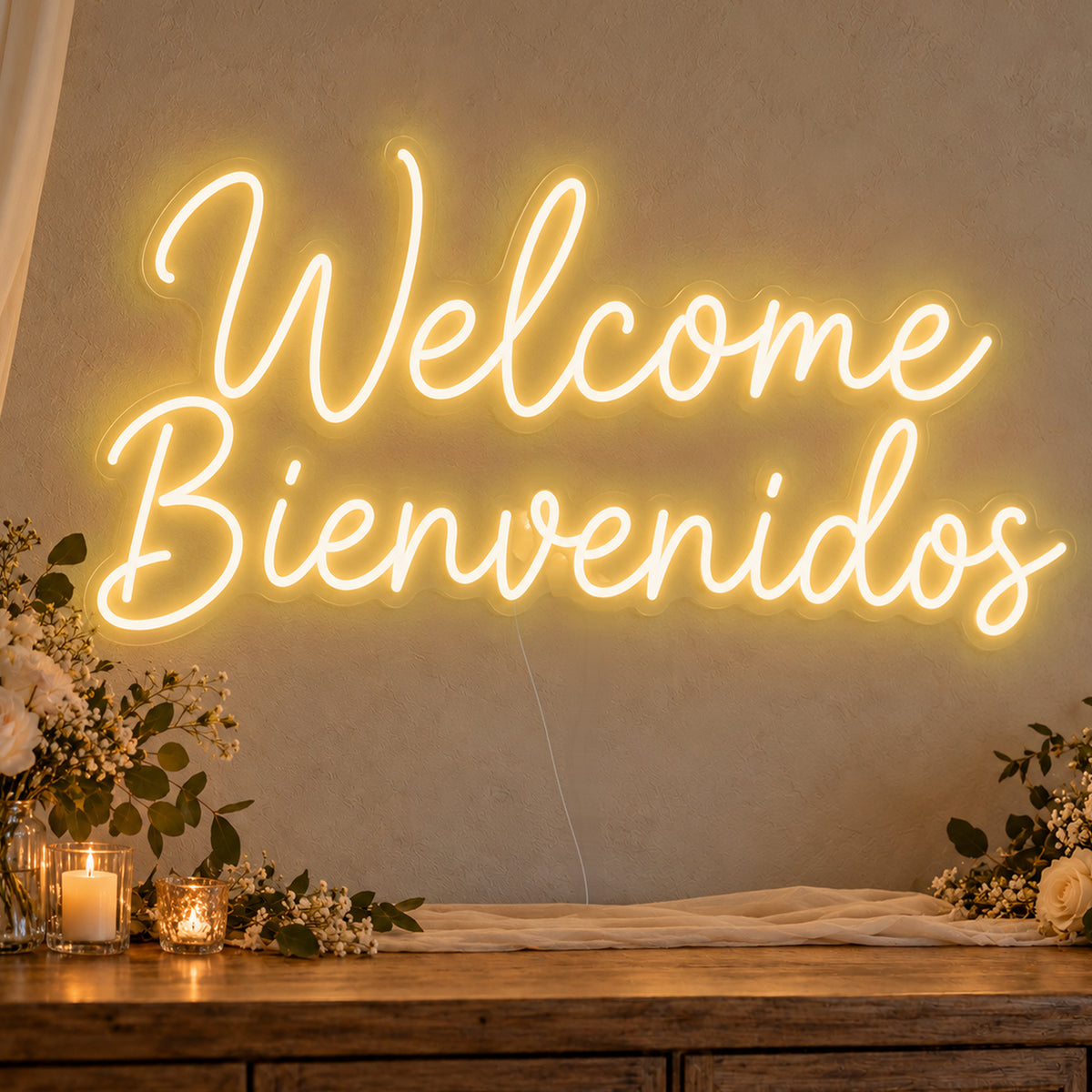 Welcome English & Spanish Neon Sign in gold LED neon on clear acrylic, angled view