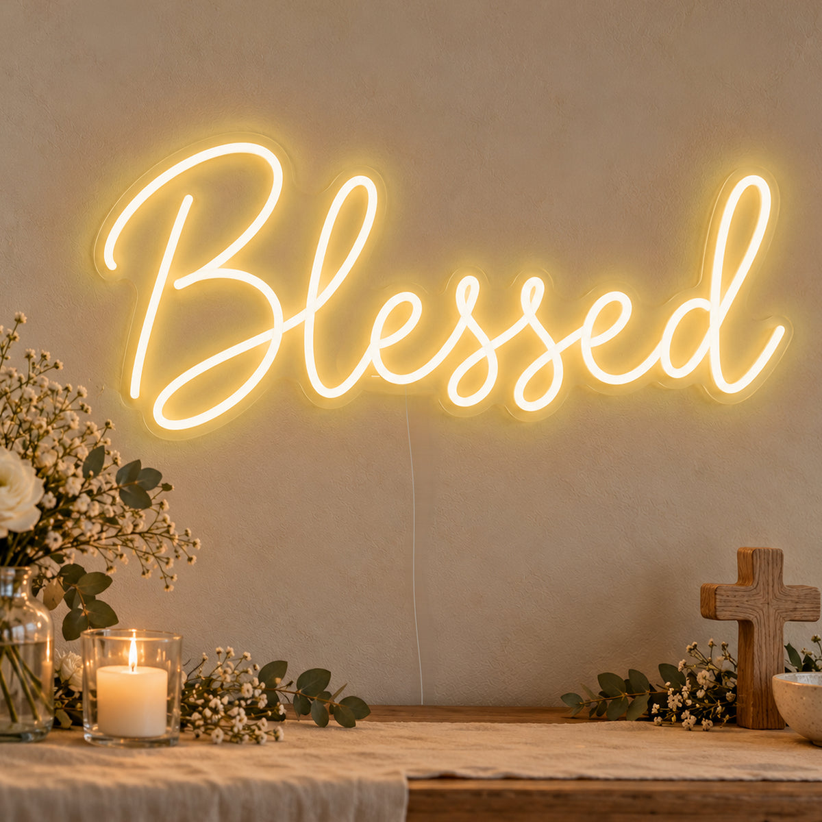 Blessed Neon Sign in gold LED neon on clear acrylic, angled view