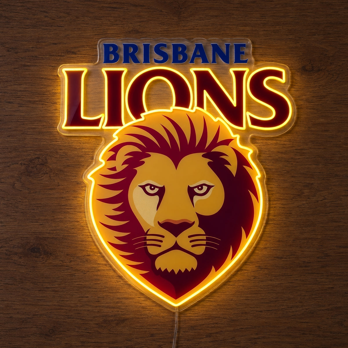 Brisbane Lions neon sign glowing brightly on a wooden surface in dim lighting