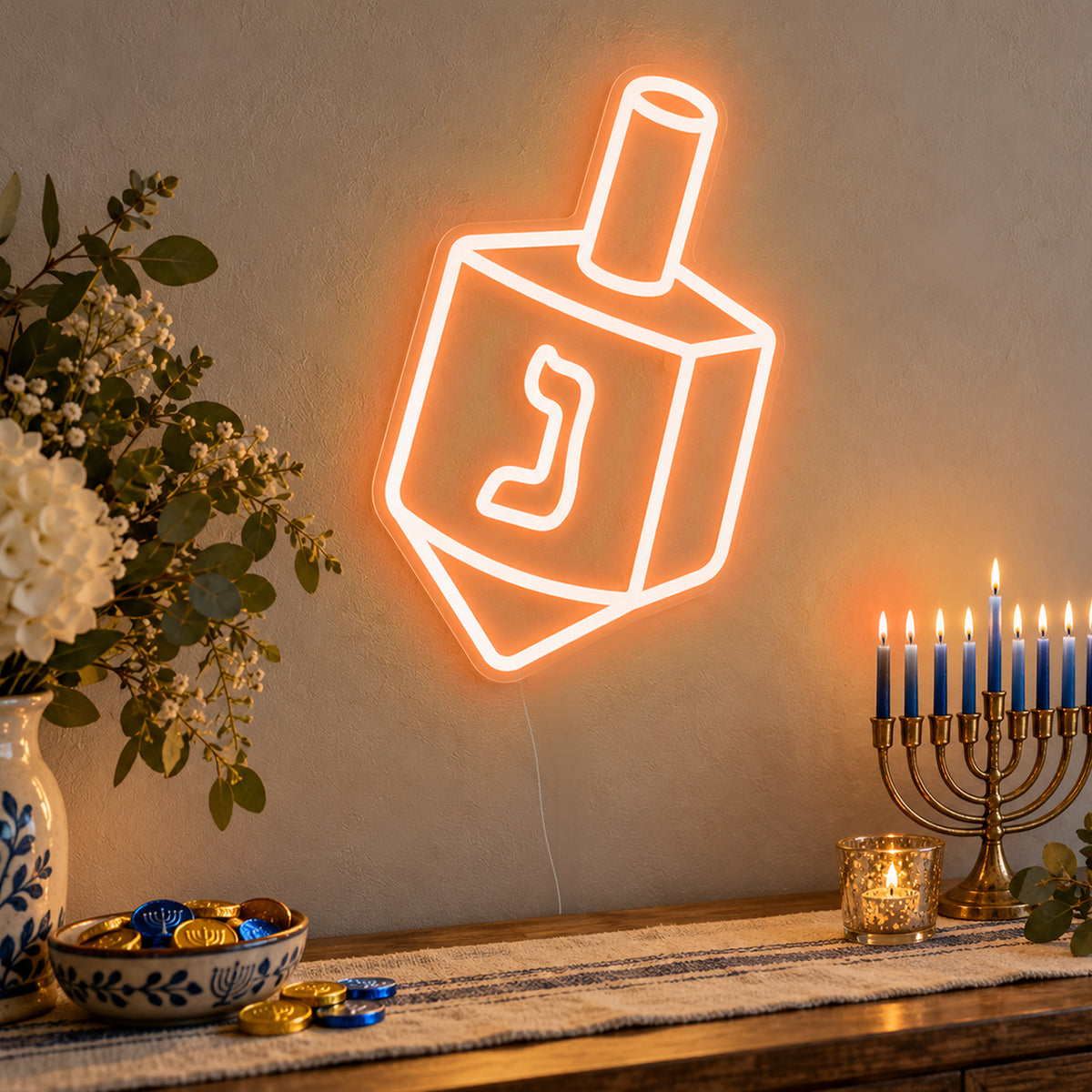 Dreidel Neon Sign in orange LED neon on clear acrylic, angled view