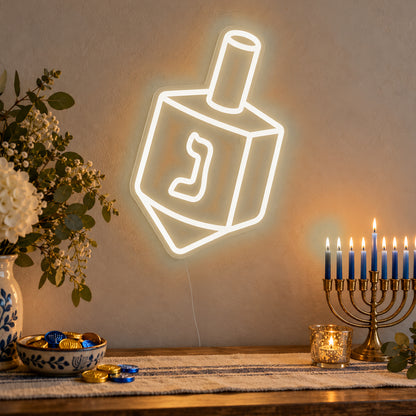 Dreidel Neon Sign in warm white LED neon on clear acrylic, angled view