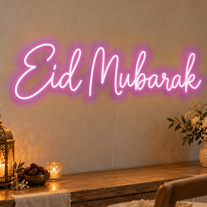 Eid Mubarak Neon Sign in pink LED neon on clear acrylic, angled view