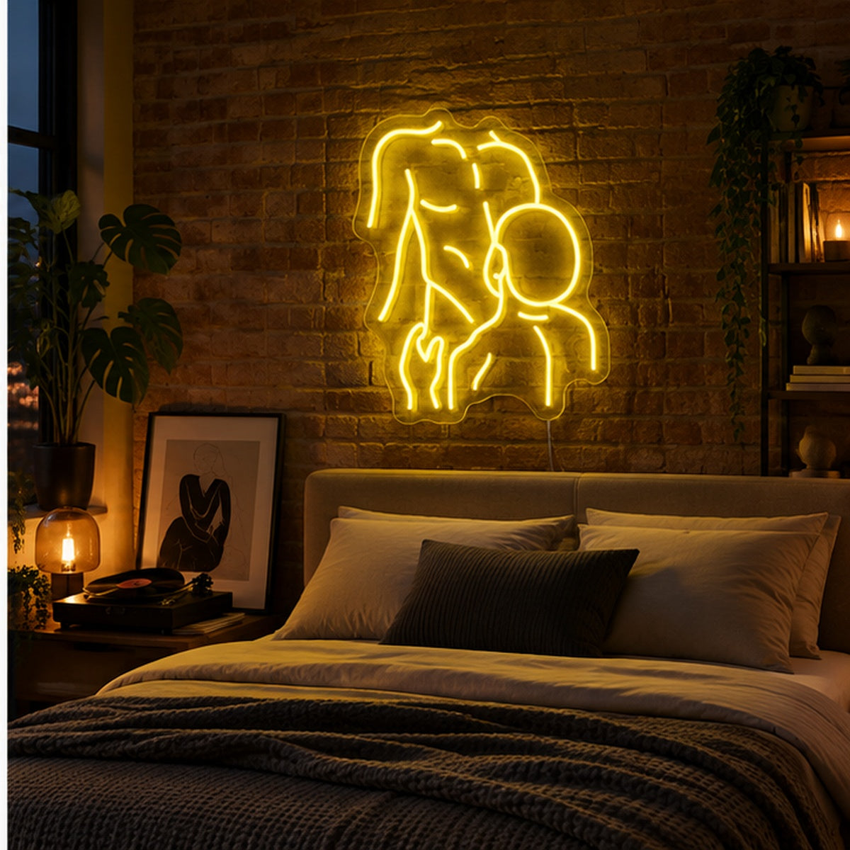 Gay Pride Two Men Neon Sign in yellow, featuring an outline of two men kissing on a brick bedroom wall above a bed.