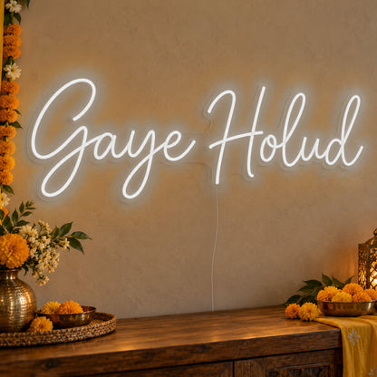 Gaye Holud Neon Sign in white LED neon on clear acrylic, angled view