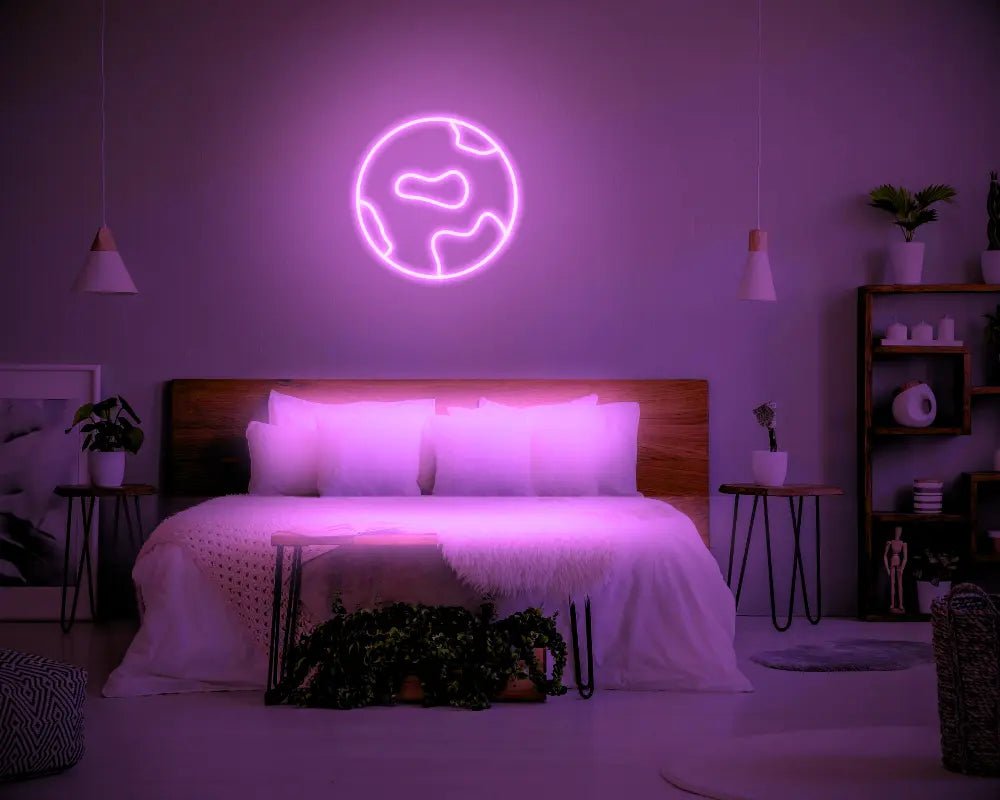 Globe LED Neon Light Sign in pink, featuring globe outline illuminated above a bed.