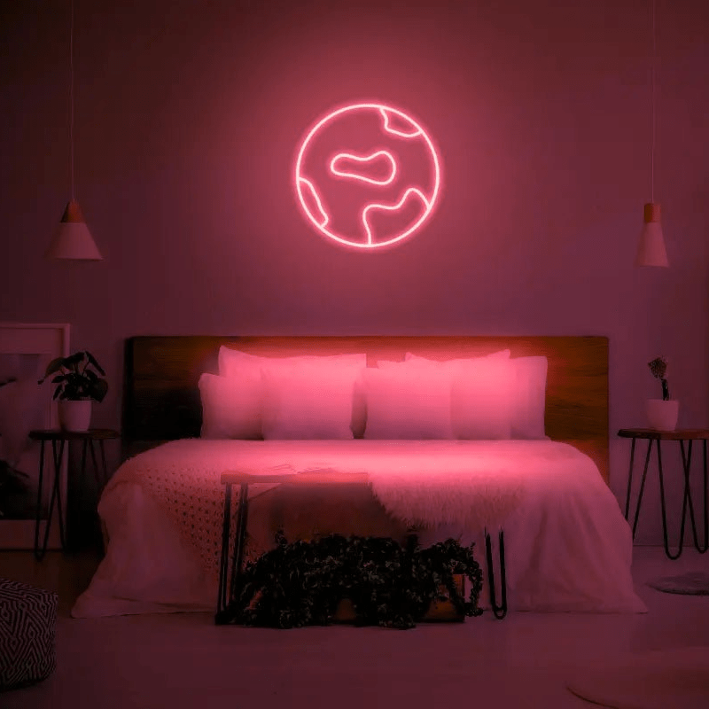 Globe LED Neon Light Sign in red, featuring globe outline illuminated above a bed.