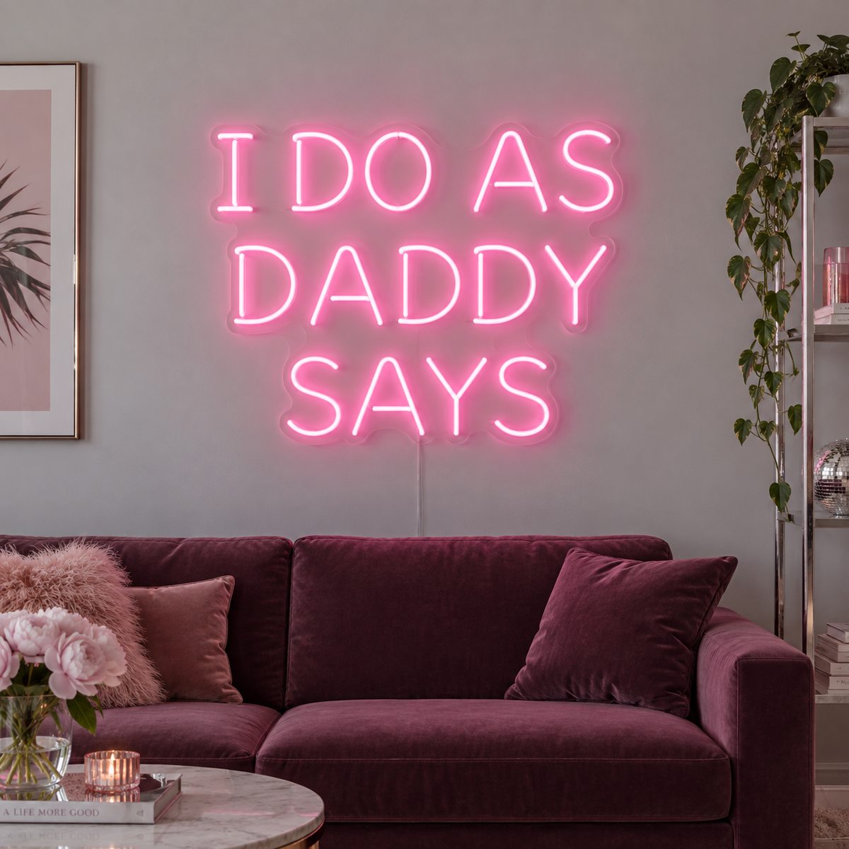 I Do As Daddy Says Neon Sign in pink, featuring I Do As Daddy Says block lettering above a pink sofa.
