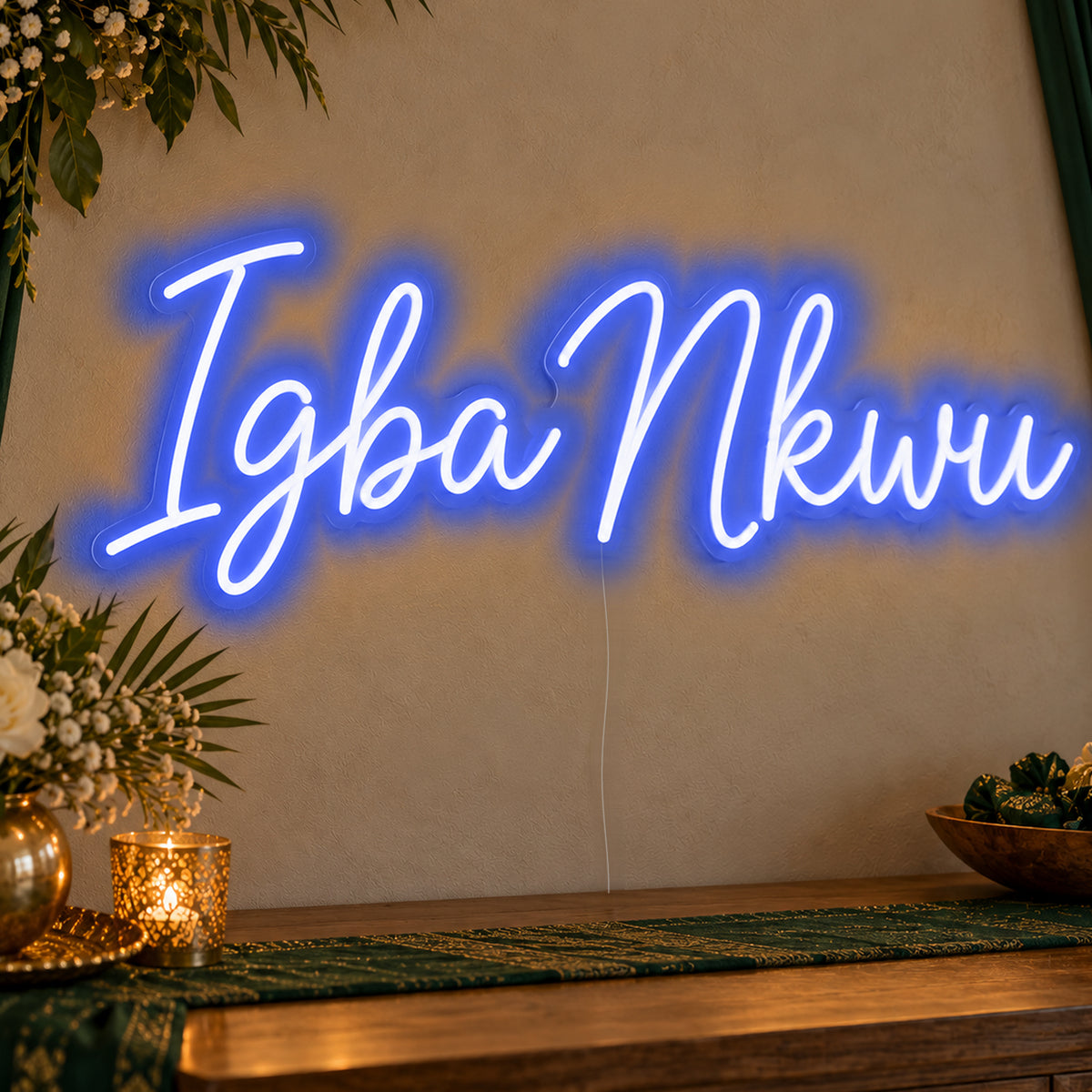 Igba Nkwu Neon Sign in blue LED neon on clear acrylic, angled view