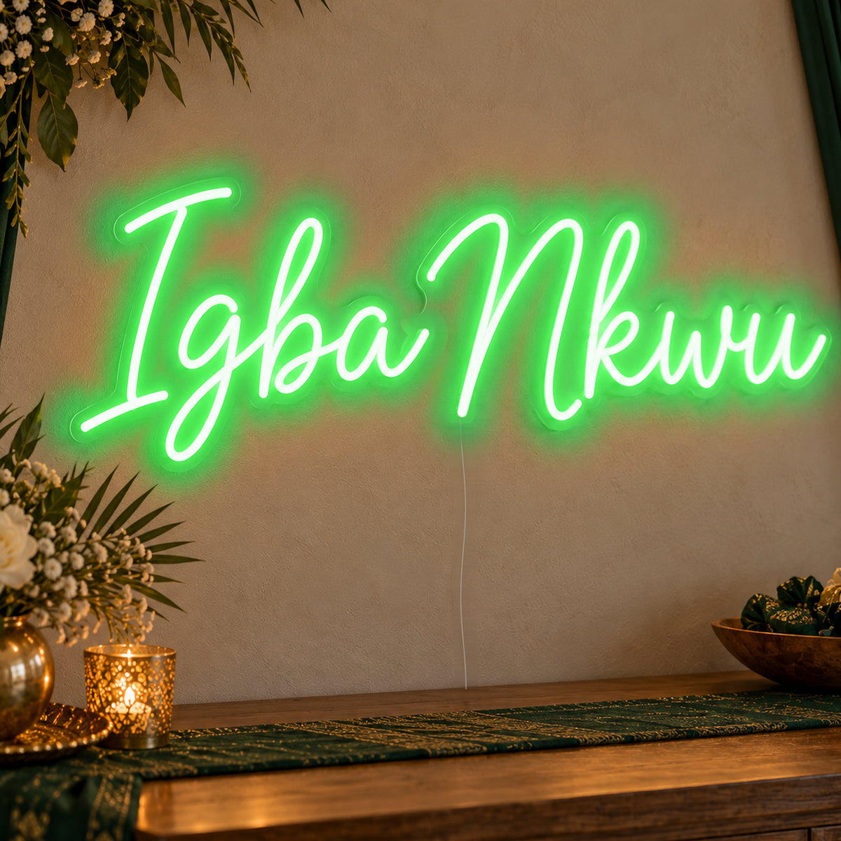 Igba Nkwu Neon Sign in green LED neon on clear acrylic, angled view
