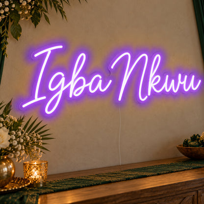 Igba Nkwu Neon Sign in purple LED neon on clear acrylic, angled view