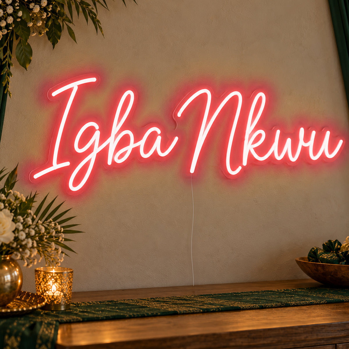 Igba Nkwu Neon Sign in red LED neon on clear acrylic, angled view