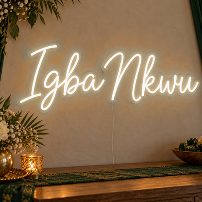 Igba Nkwu Neon Sign in warm white LED neon on clear acrylic, angled view