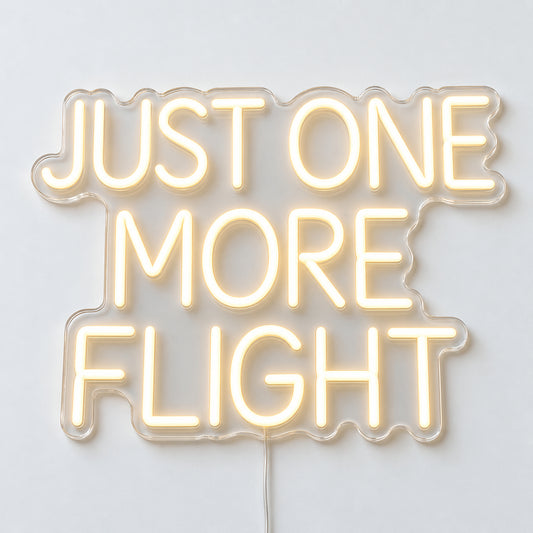 Just One More Flight Neon Sign, featuring Just One More Flight lettering for aviation enthusiasts, on a single clear acrylic backing displayed on a white surface.