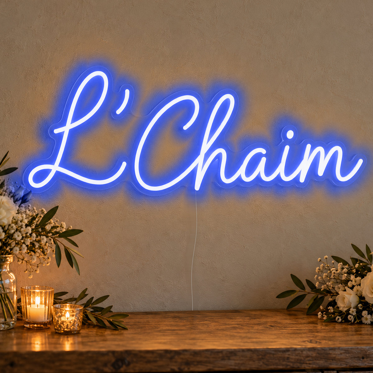 L’Chaim Neon Sign in blue LED neon on clear acrylic, angled view