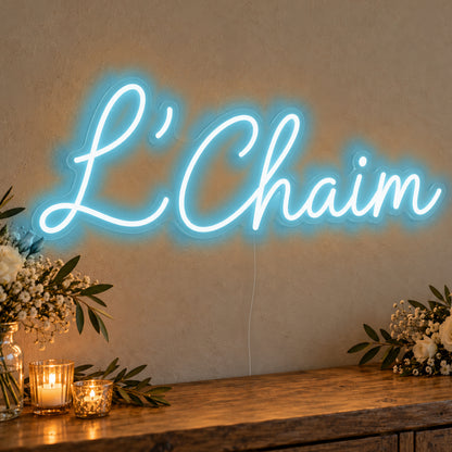 L’Chaim Neon Sign in ice blue LED neon on clear acrylic, angled view