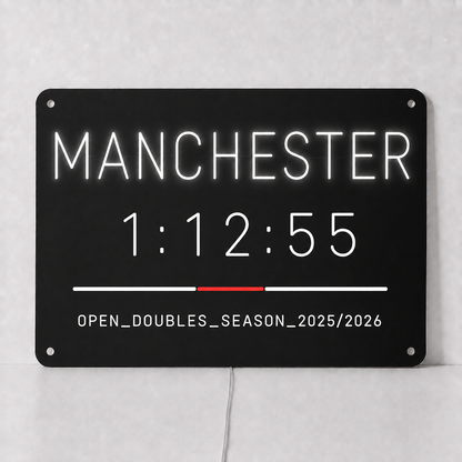 Custom hybrid race finish time LED neon sign shown with Manchester, a personalised finish time and a division and season line in white neon on black acrylic