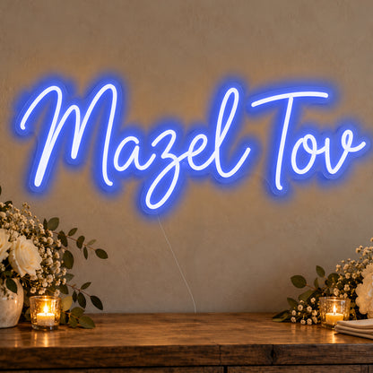 Mazel Tov Neon Sign in blue LED neon on clear acrylic, angled view