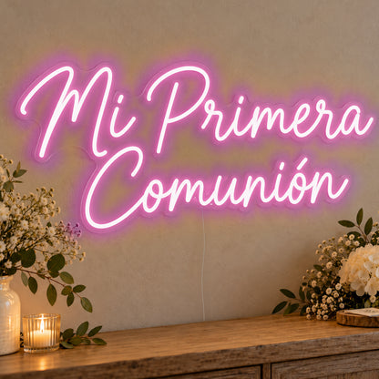 Mi Primera Comunión Neon Sign in pink LED neon on clear acrylic, angled view