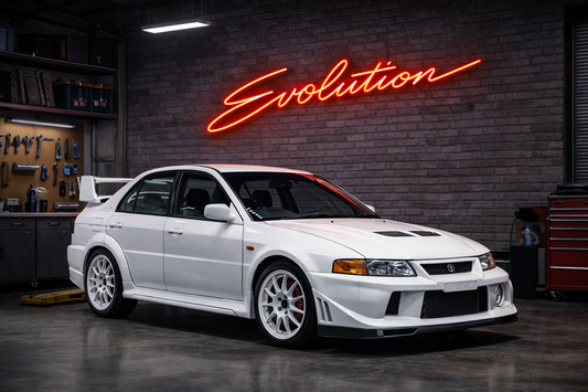 Red Mitsubishi Lancer Evolution inspired LED neon sign on garage wall, premium car neon sign Australia by Neon Lanes.