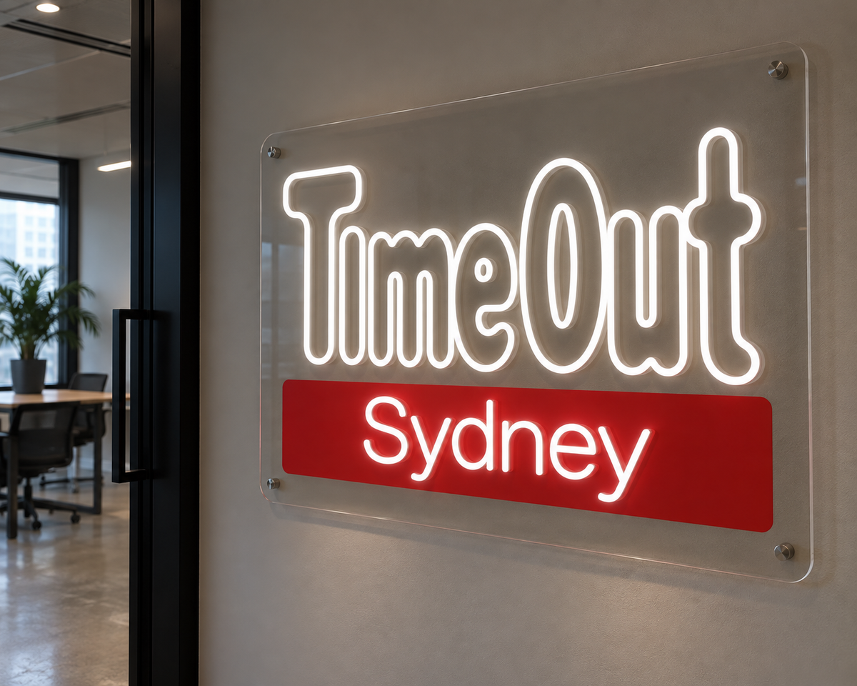 White TimeOut Sydney LED neon sign on clear acrylic, shown as custom sign inspiration for Surry Hills.