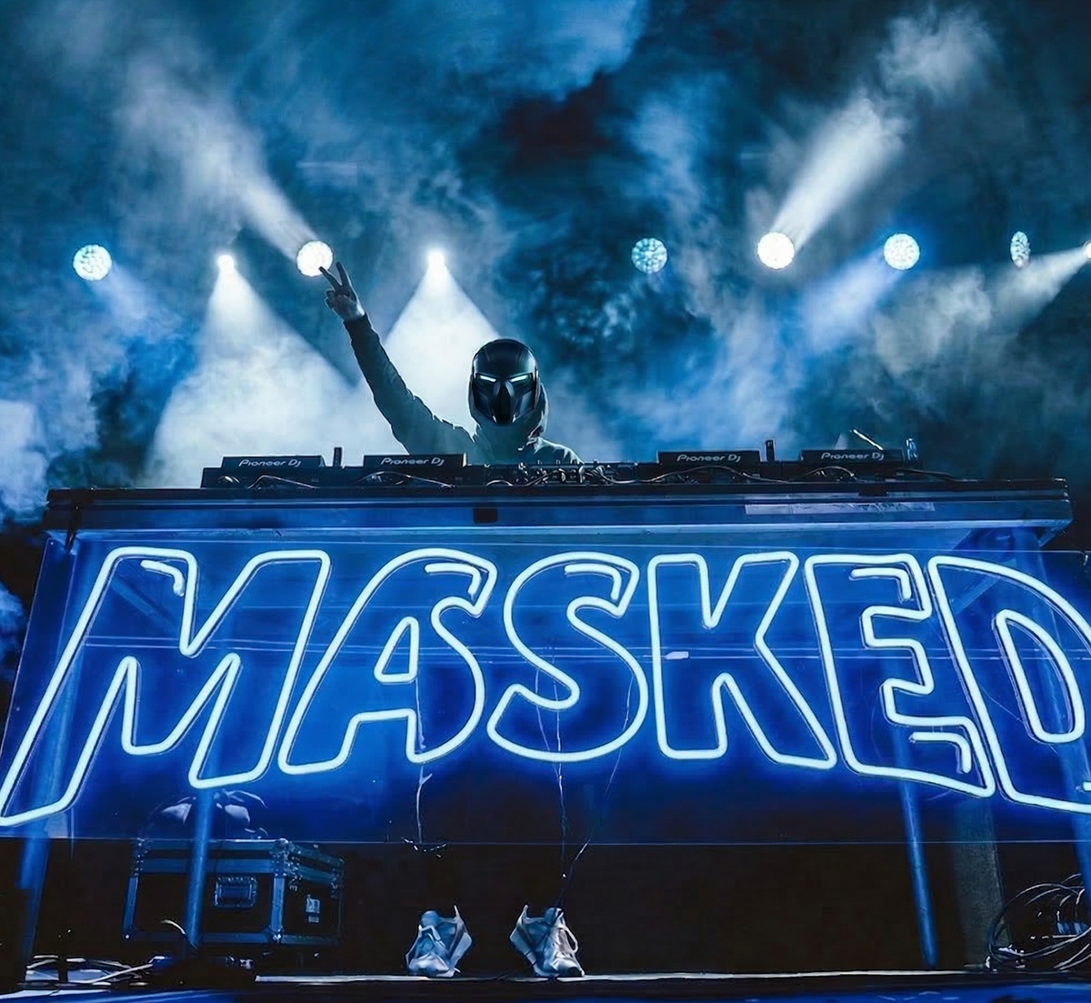 Blue MASKED LED neon sign across a DJ booth, shown as custom sign inspiration for Unley.