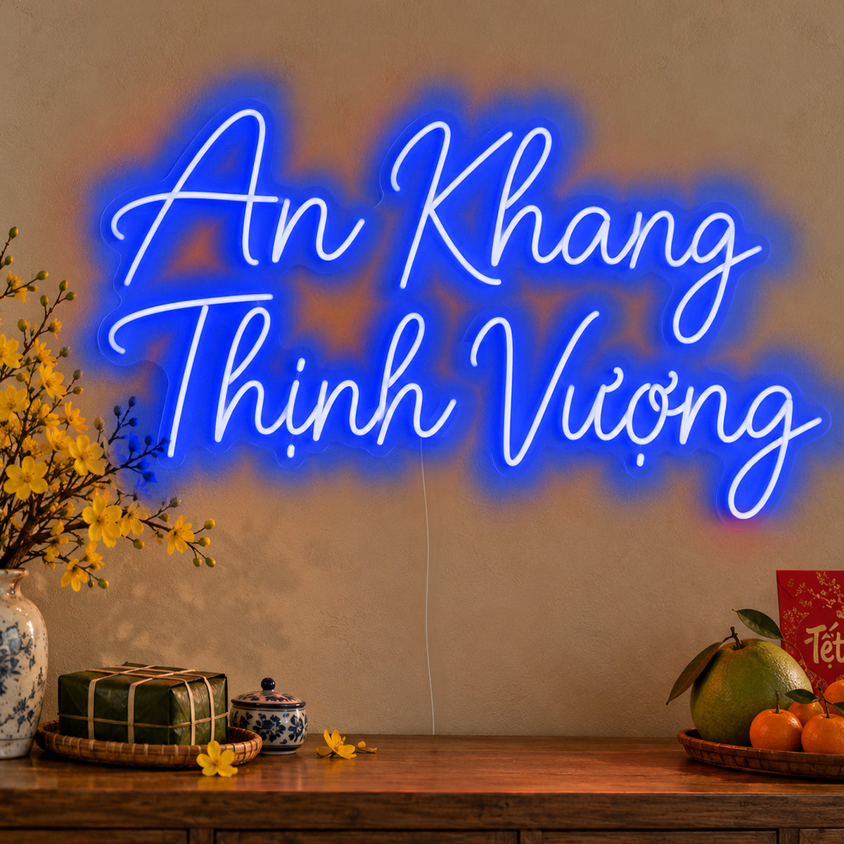 An Khang Thịnh Vượng Neon Sign in blue LED neon on clear acrylic, angled view