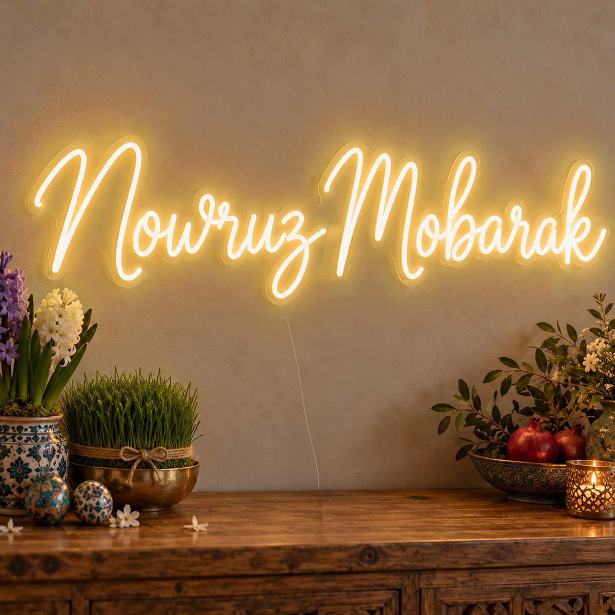 Nowruz Mobarak Neon Sign in gold LED neon on clear acrylic, angled view