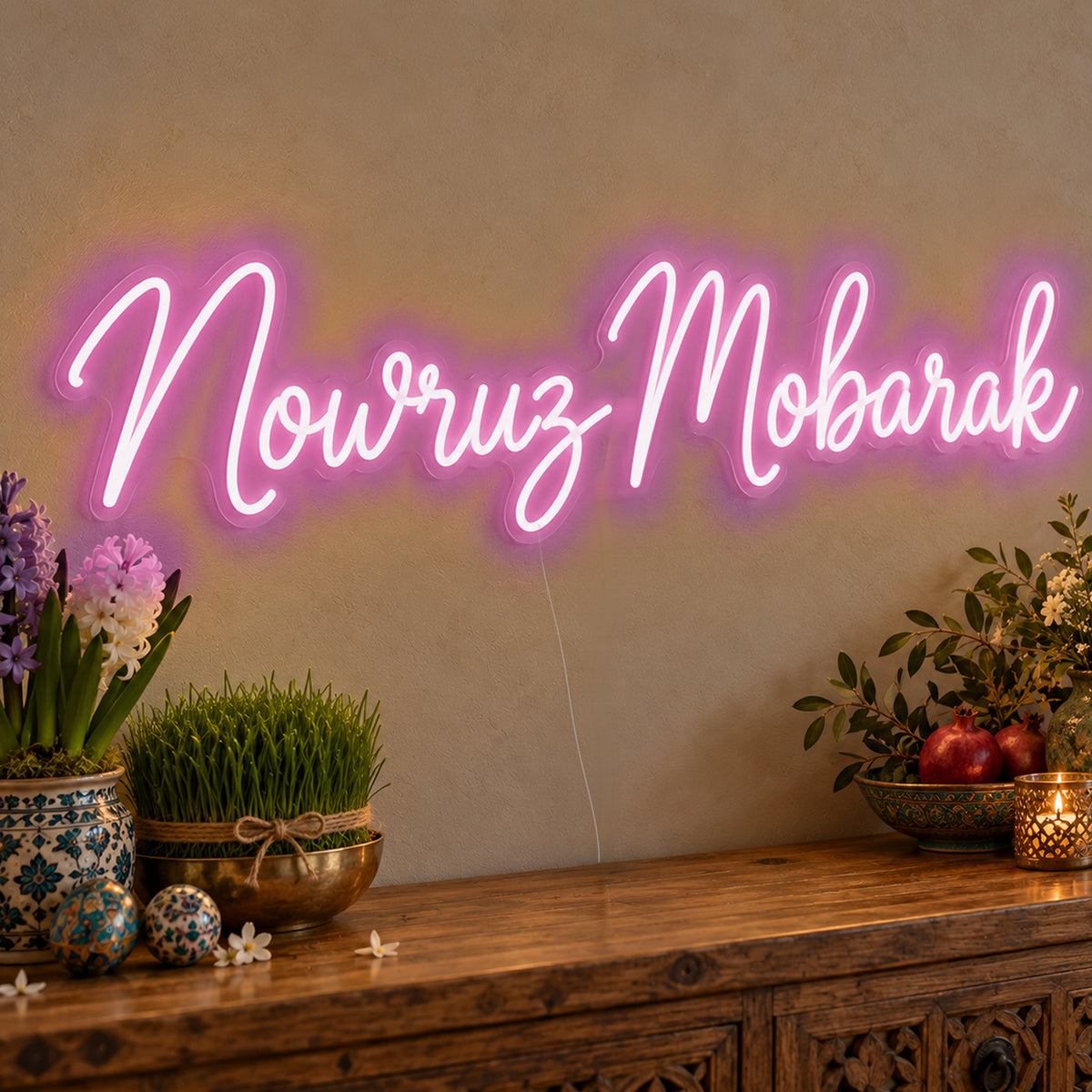 Nowruz Mobarak Neon Sign in pink LED neon on clear acrylic, angled view