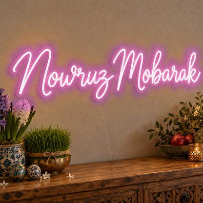 Nowruz Mobarak Neon Sign in pink LED neon on clear acrylic, angled view