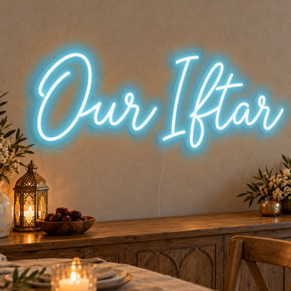 Our Iftar Neon Sign in ice blue LED neon on clear acrylic, angled view