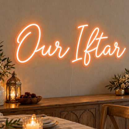Our Iftar Neon Sign in orange LED neon on clear acrylic, angled view