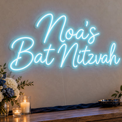 Personalised Bat Mitzvah Neon Sign in ice blue LED neon on clear acrylic, angled view
