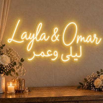 Personalised Bilingual Arabic English Names Neon Sign in gold LED neon on clear acrylic, angled view
