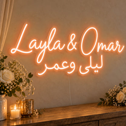 Personalised Bilingual Arabic English Names Neon Sign in orange LED neon on clear acrylic, angled view