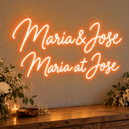Personalised Bilingual Filipino Names Neon Sign in orange LED neon on clear acrylic, angled view