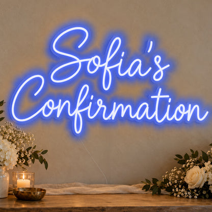 Personalised Confirmation Neon Sign in blue LED neon on clear acrylic, angled view